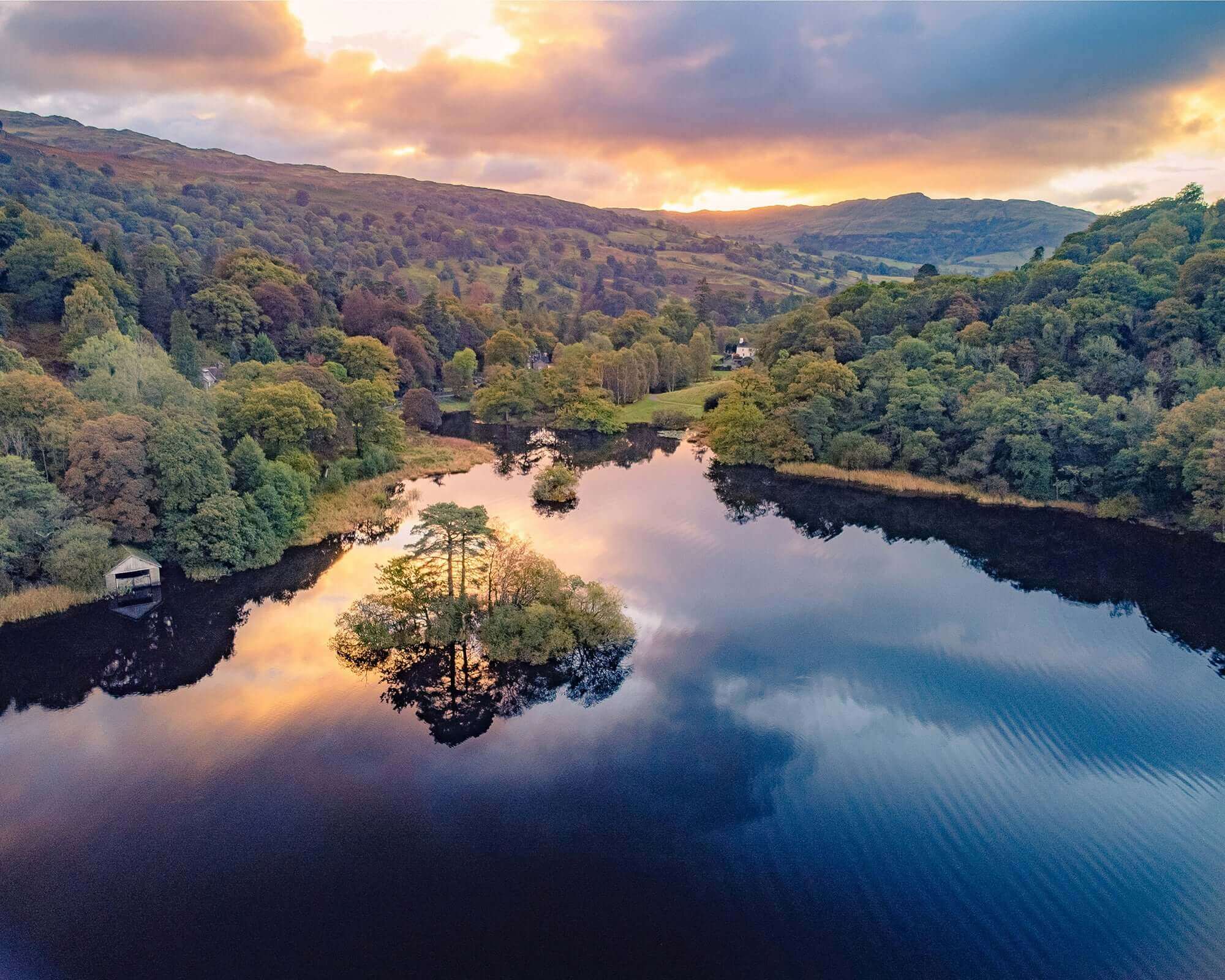 Elevated view of lakes, mountains and sunset