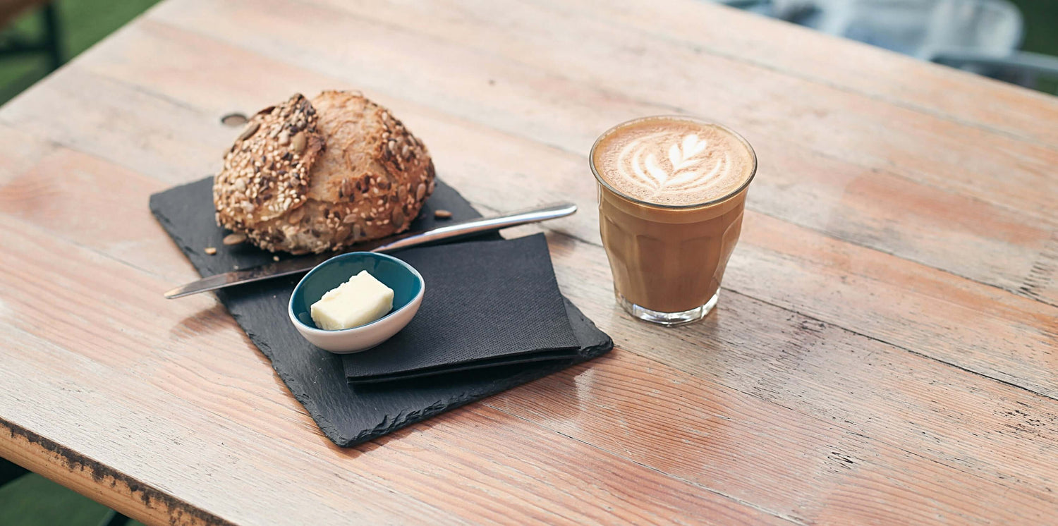 Coffee and a pastry on a table